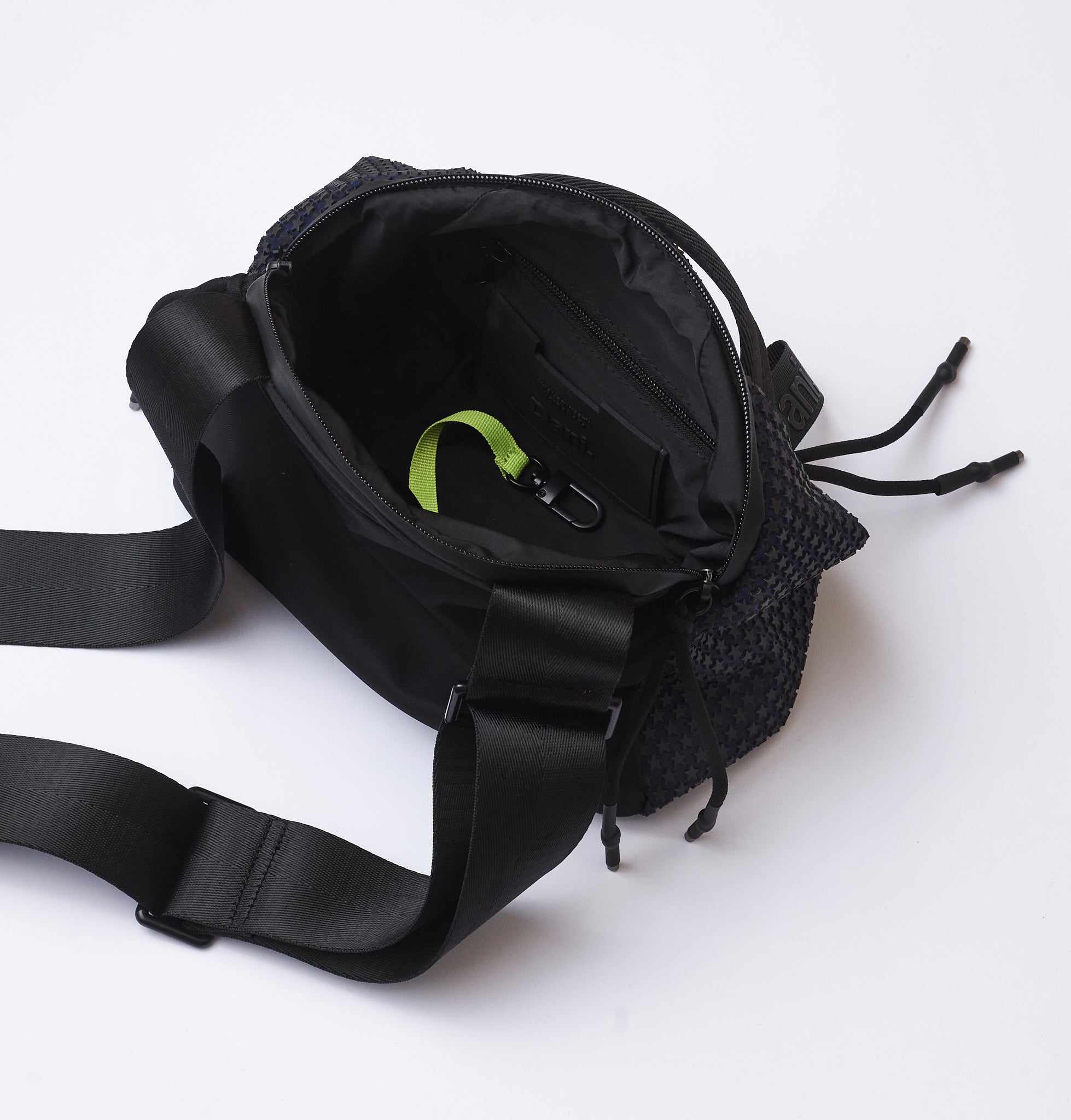 Black waist bag with a strap on a white background